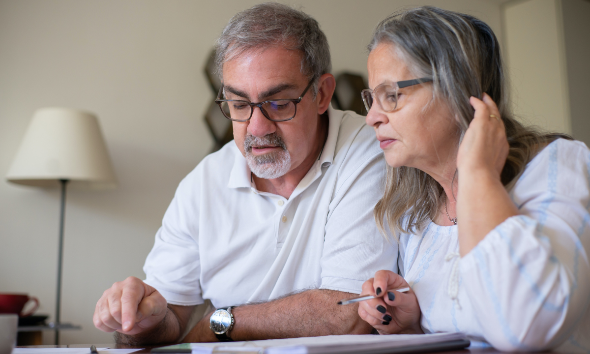 Remodel vs renovation - an elderly couple researching home remodels